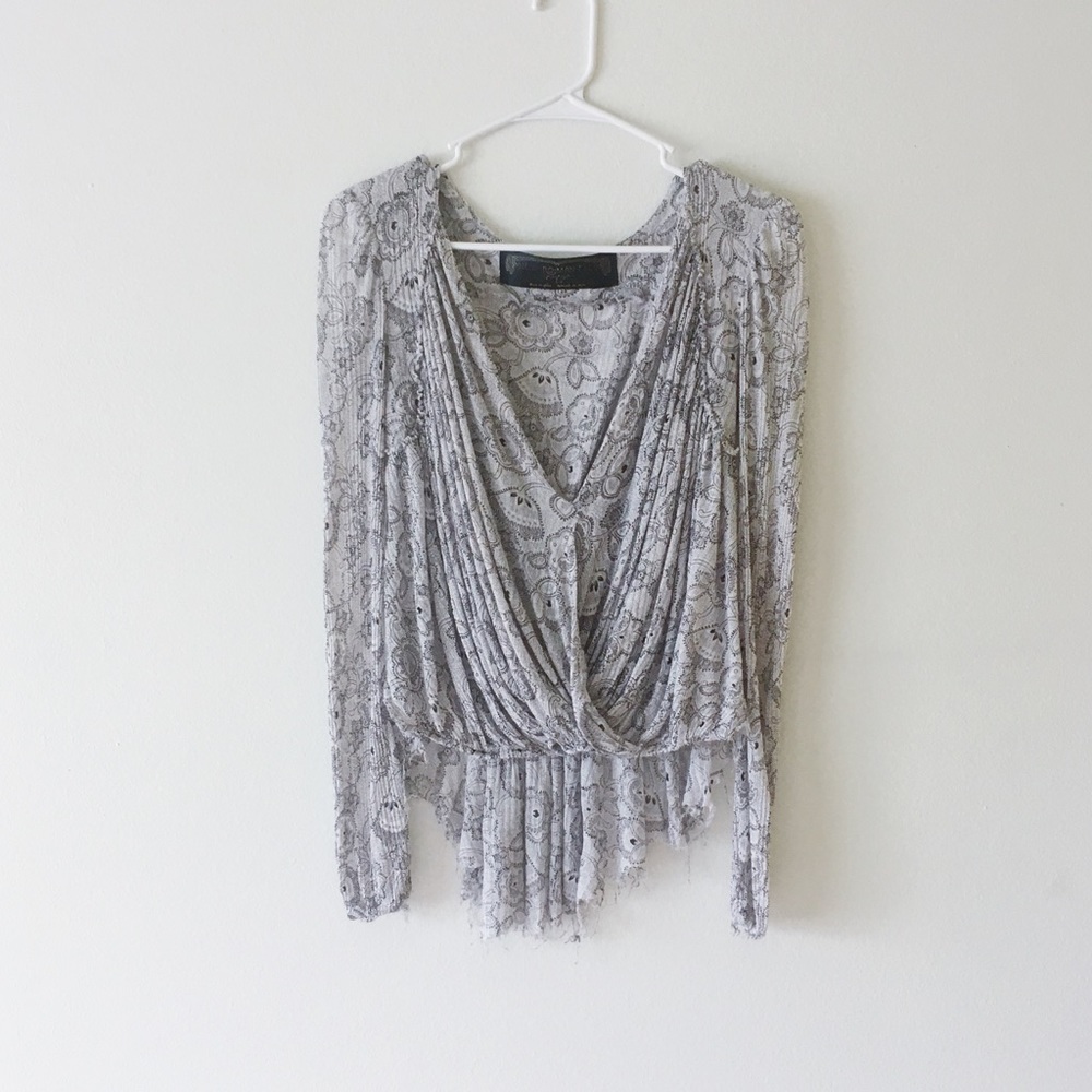 Free People surplus wrap raw edge top.